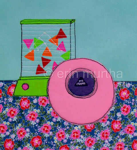 A magic 8 ball date ball reads "It is Certain" as a 90s water toy sits behind it on a bright floral surface. These have both been constructed of fabric and thread in a 2 dimensional setting by artist erin murtha